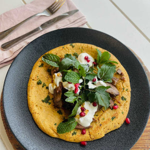 Greek-style pulled lamb on chickpea pancake